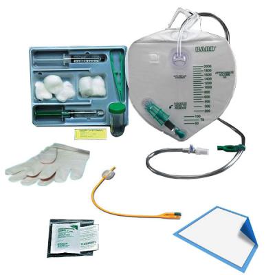 Urological Medical supplies kit featuring gloves, gauze, a collection container, and a catheter.